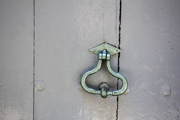 istock Old door knocker on a door 640987796