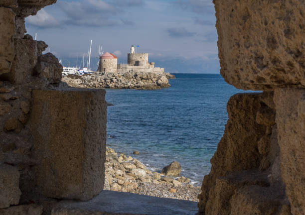istock Rhodes windmills, castle and lighthouse 640988036