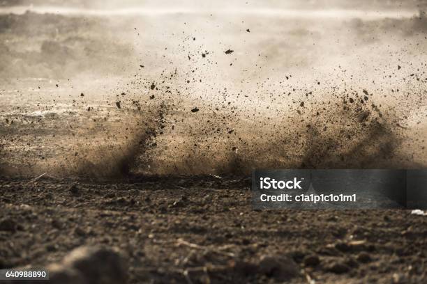 Dirt Fly After Motocross Roaring By Stock Photo - Download Image Now - Mud, Dirt, Dust