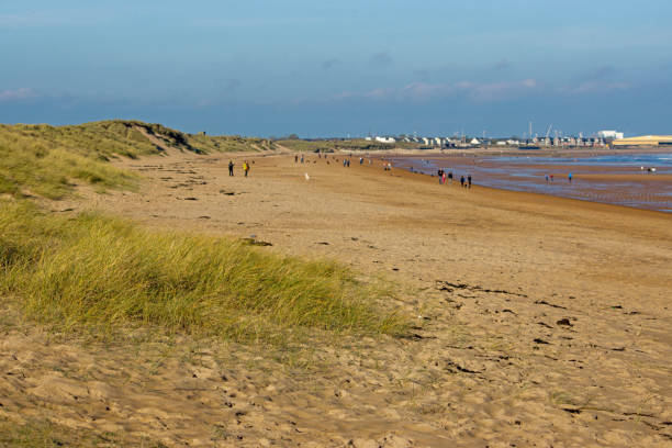 istock Sand dunes and beach at Seaton Sluice 640989264