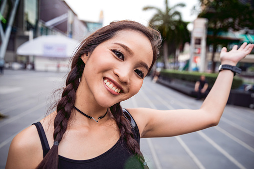 Thai woman portrait outdoor in the city in Bangkok, Thailand.