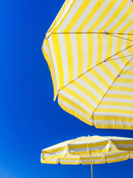 istock Colorful parasol against blue sky 640992934