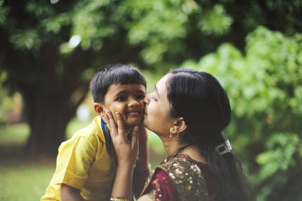 istock Mother Kissing Son 640998178