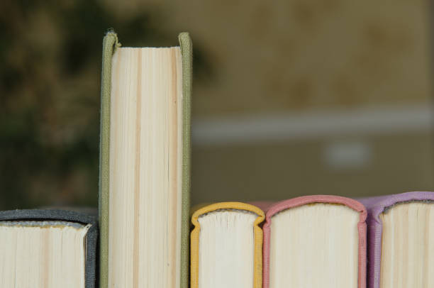 istock a stack of colorful books in a library 640998196