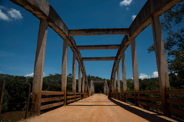 istock Dirt road crossing an unpaved bridge 641001360