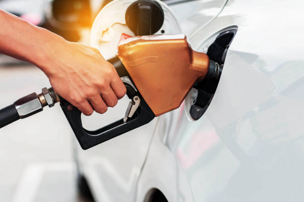 istock fuel nozzle on cars. 641001958