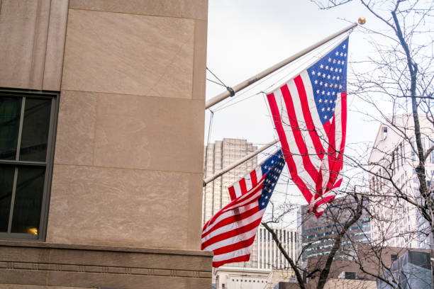 istock US Flag on Manhattan buildings in New York downtown. 641003652