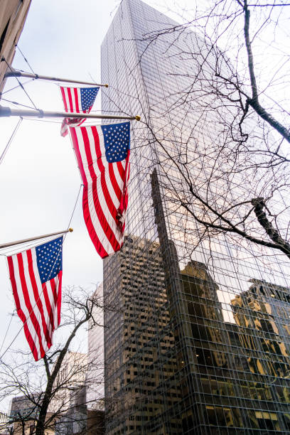 istock US Flag on Manhattan buildings in New York downtown. 641003654