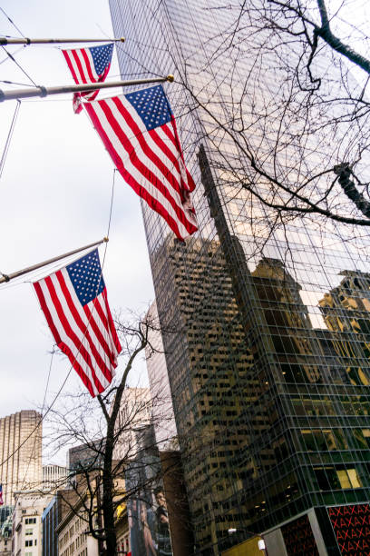 istock US Flag on Manhattan buildings in New York downtown. 641003660