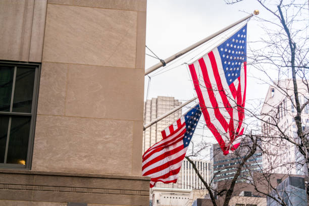 istock US Flag on Manhattan buildings in New York downtown. 641003662