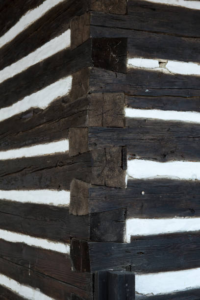 istock Wall of the timbered cottage - wood texture 641009806