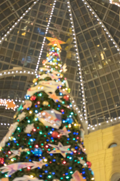 istock Blurred image of Christmas tree with lighting and decoration. 641011392