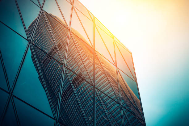 istock Modern commercial building with sun ray reflection in window 641011932