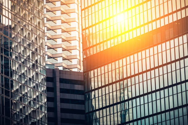 istock Modern commercial building with sun ray reflection in window 641011934
