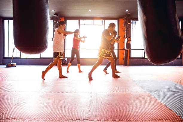 istock Muay Thai workout - Motivational training at the gym facility 641012864