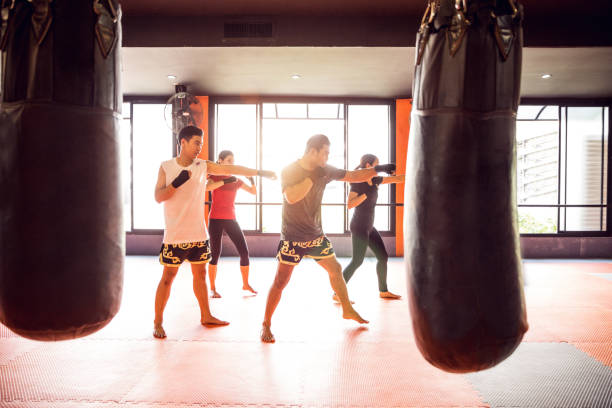 istock Muay Thai workout - Motivational training at the gym facility 641013298