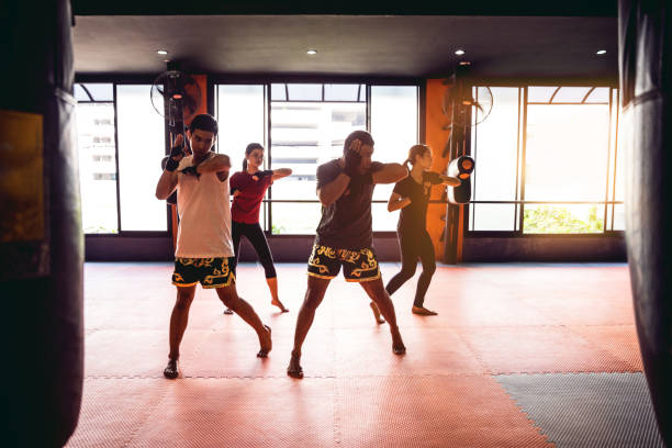istock Muay Thai workout - Motivational training at the gym facility 641013518