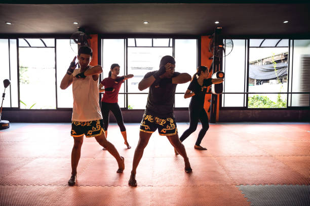 istock Muay Thai workout - Motivational training at the gym facility 641014262