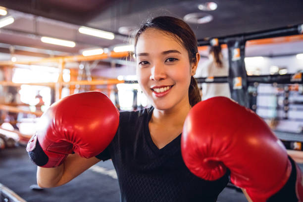 istock Muay Thai workout - Motivational training at the gym facility 641014414