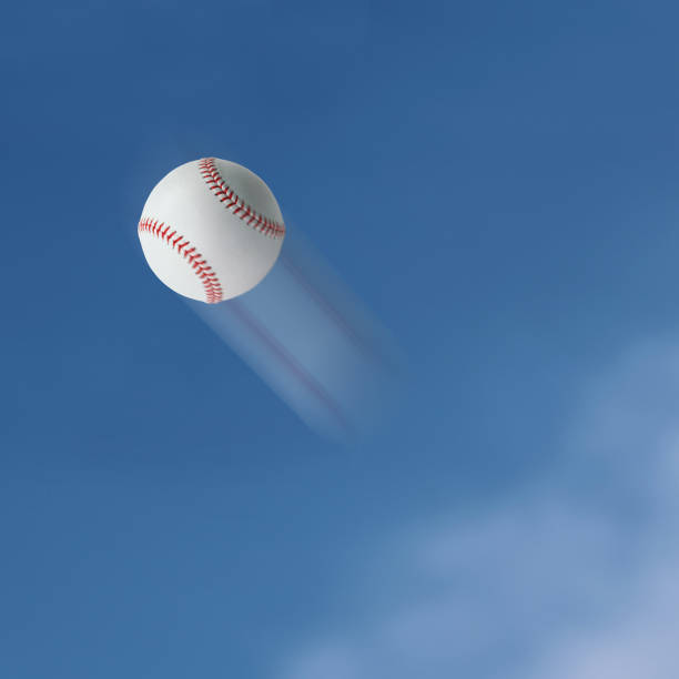 Baseball Baseball flying into the sky. home run photos stock pictures, royalty-free photos & images