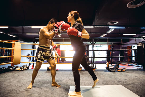 istock Muay Thai workout - Motivational training at the gym facility 641016624