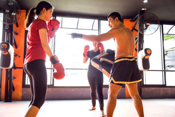 istock Muay Thai workout - Motivational training at the gym facility 641017602