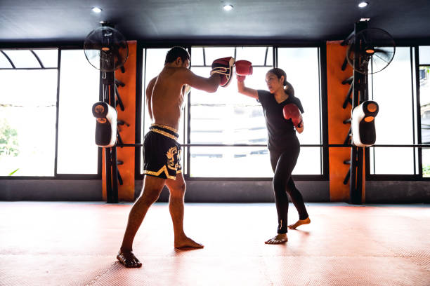 istock Muay Thai workout - Motivational training at the gym facility 641017814