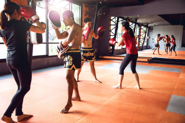 istock Muay Thai workout - Motivational training at the gym facility 641018196