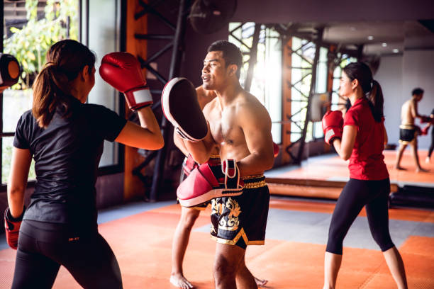 istock Muay Thai workout - Motivational training at the gym facility 641018236