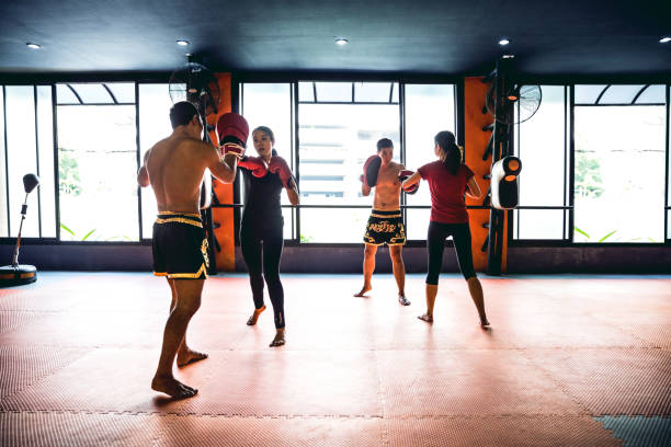 istock Muay Thai workout - Motivational training at the gym facility 641018444