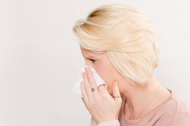 istock Profile Shot of Lady Pressing Tissue on Nose Copy Space 641018682