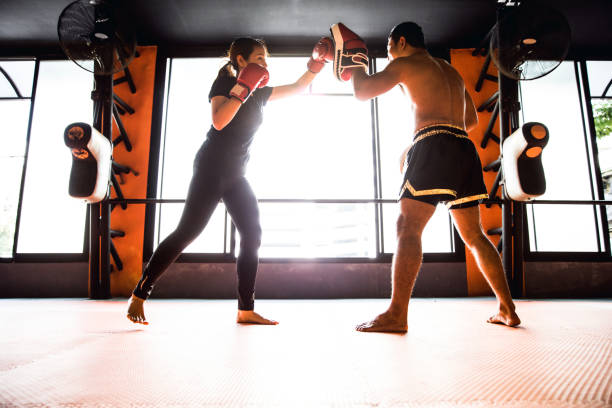 istock Muay Thai workout - Motivational training at the gym facility 641018996