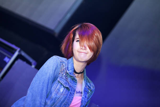 istock Cute female thai rock singer 641019754