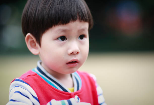 istock Cute children playing in the park 641019924