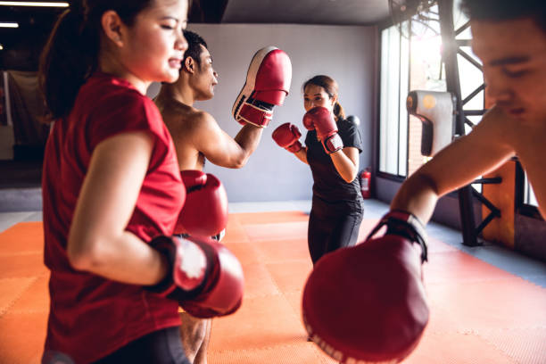 istock Muay Thai workout - Motivational training at the gym facility 641020220