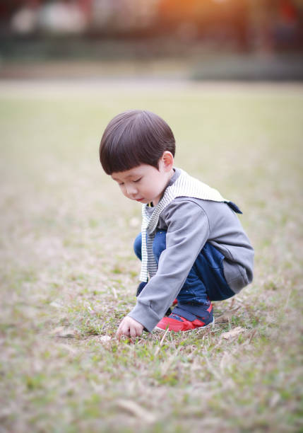 istock Cute children playing in the park 641020398