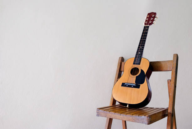 Guitar classic on the chair, music, pop, jazz