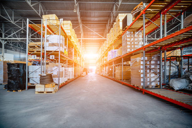 istock Long shelves with a variety of boxes and containers. 641021766