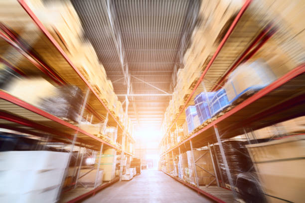 istock Long shelves with a variety of boxes and containers. 641021806