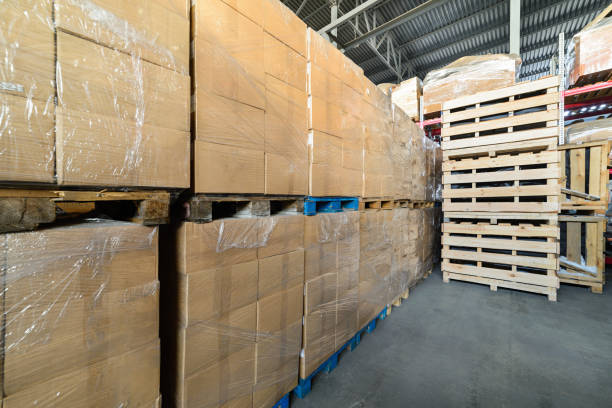 istock Cardboard boxes wrapped in stretch film. 641021810