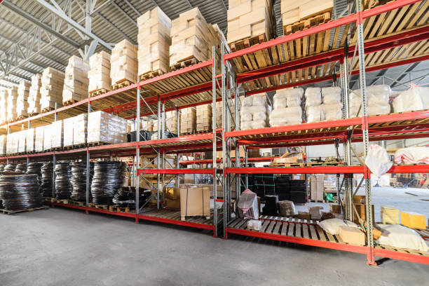 istock Long shelves with a variety of boxes and containers. 641021812