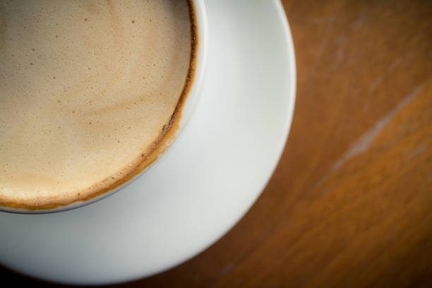 istock hot coffee with foam milk 641023390