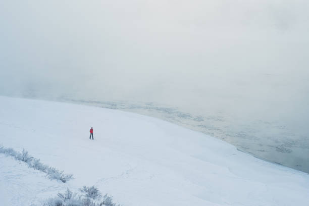 Woman Walking at winter River