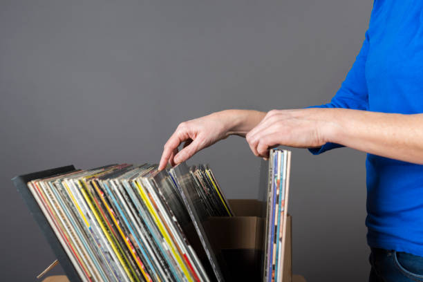 istock couple searching records in a music store 641024308