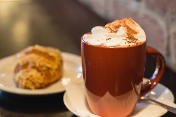 istock Coffee with whipped cream for breakfast with croissant 641024732