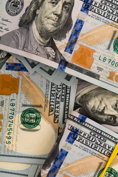 istock Packs of hundred dollar bills 641024892