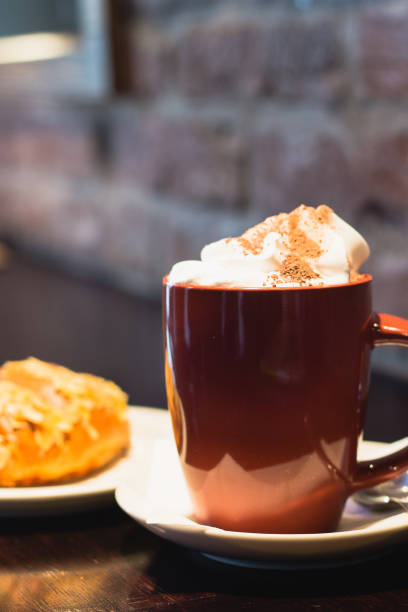 istock Coffee with whiped cream for breakfast with croissant 641024976