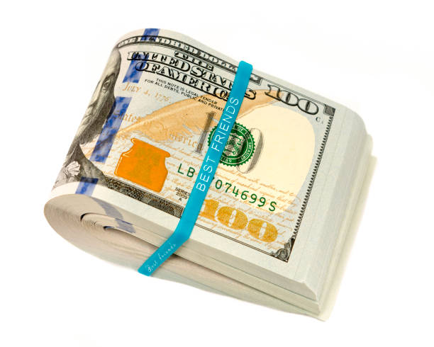 istock Stack of money in US dollars cash banknotes 641025200