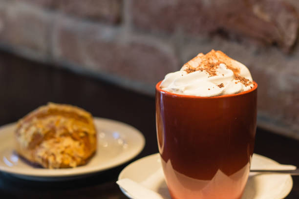 istock Coffee with whipped cream for breakfast with croissant 641025498