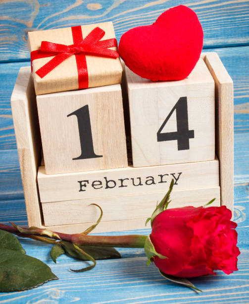 istock Cube calendar with gift, red heart and rose flower 641027542